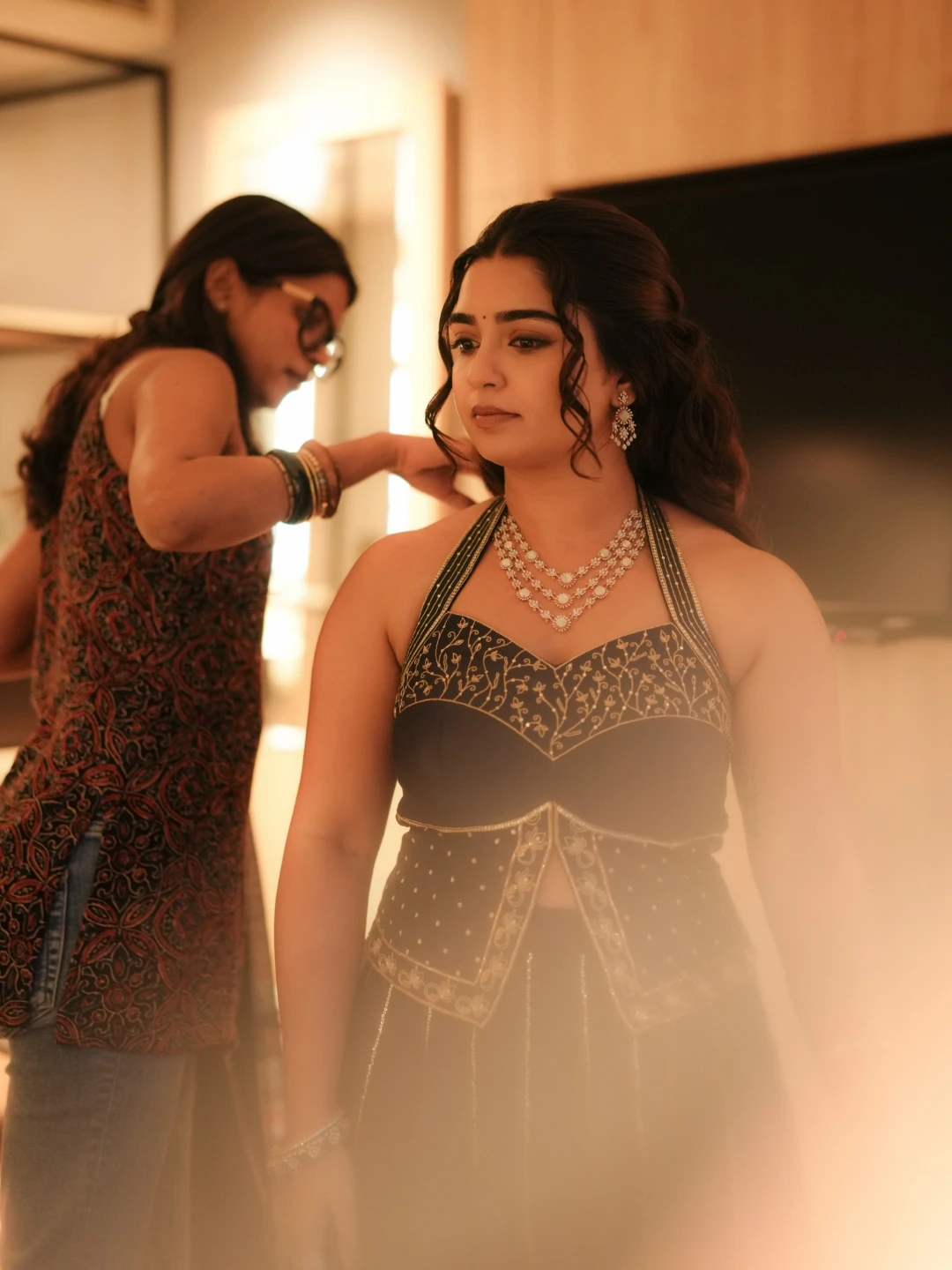 Gouri Kishan candid look in embroidered halter neck blouse at ad shoot