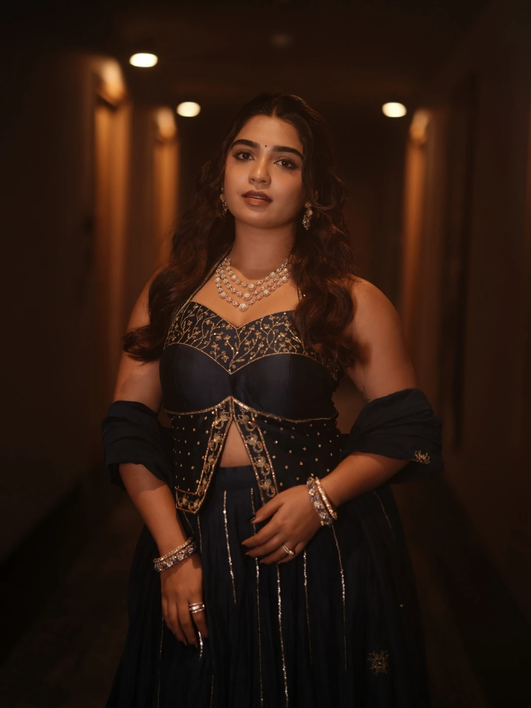Gouri Kishan posing in hallway for Kalyan Jewellers festive photoshoot